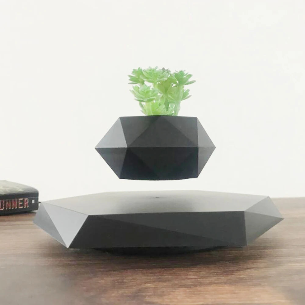 Découvrez notre pot flottant magnétique : une décoration moderne et élégante qui fait tourner vos plantes à 360°. Grâce à la lévitation magnétique, votre intérieur devient plus stylé, zen et unique. Idéal pour bureaux, salons et espaces design.